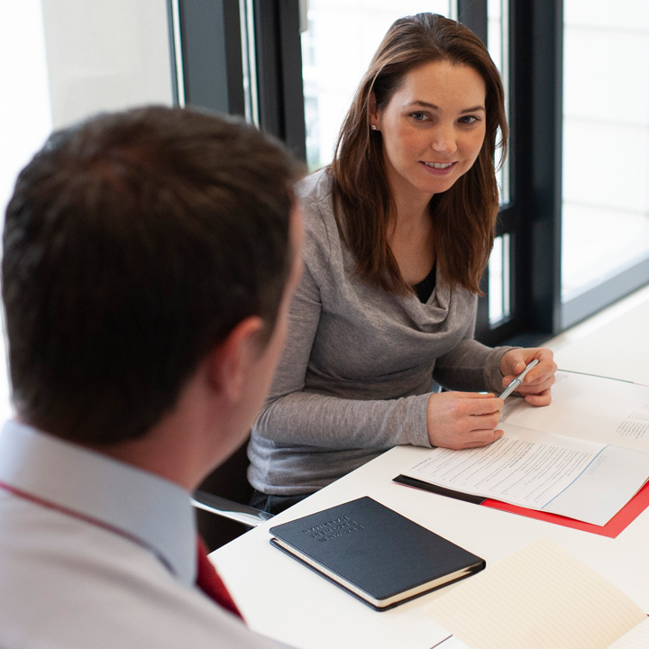 Two Seed4equity employees in conference room